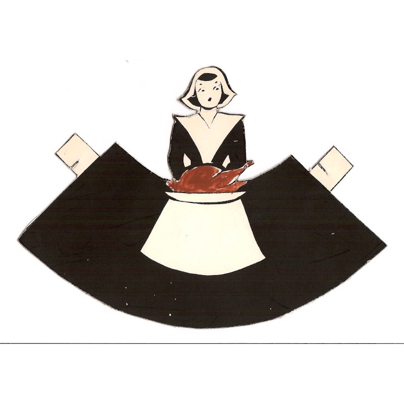 A Thanksgiving table place card in the shape of a pilgrim woman holding a turkey.